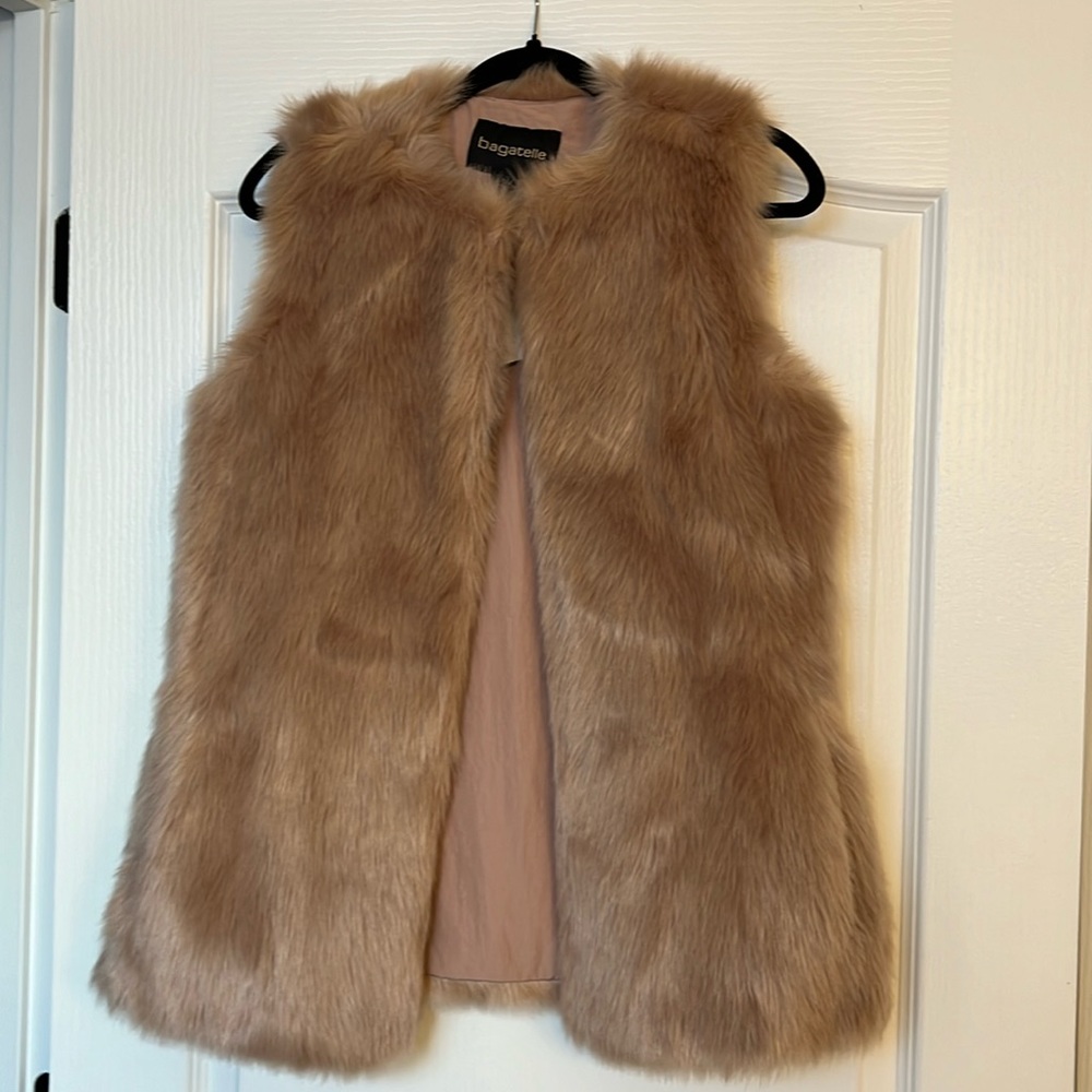Beautiful faux fur vest in soft pink perfect for chilly nights